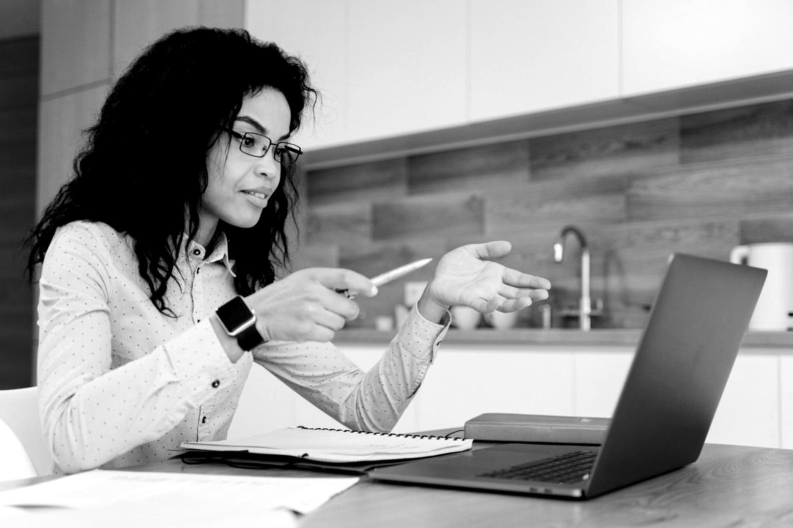 Finance professionals collaborating on investment reports